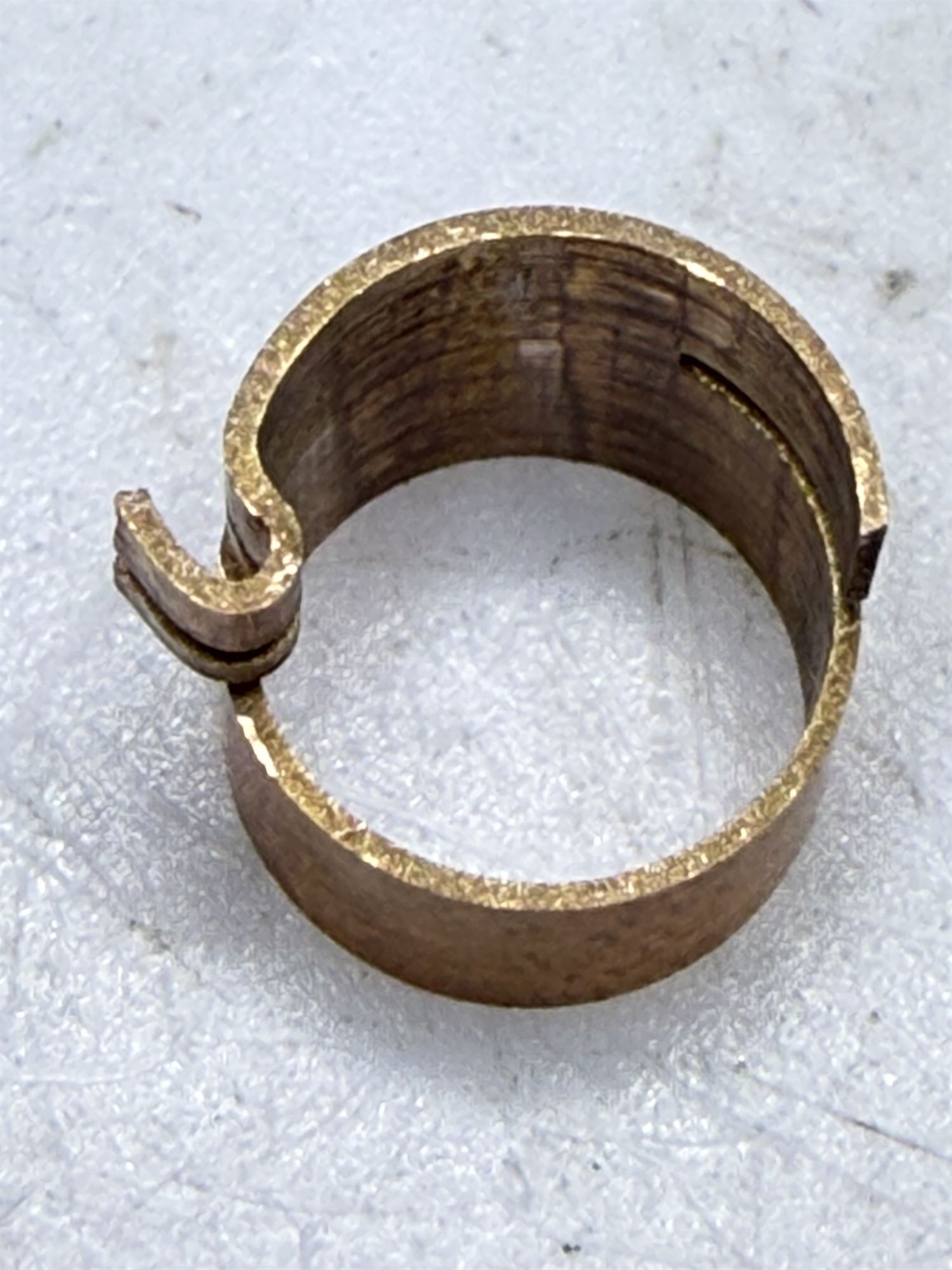 Prototype copper medical instrument part with a formed hook