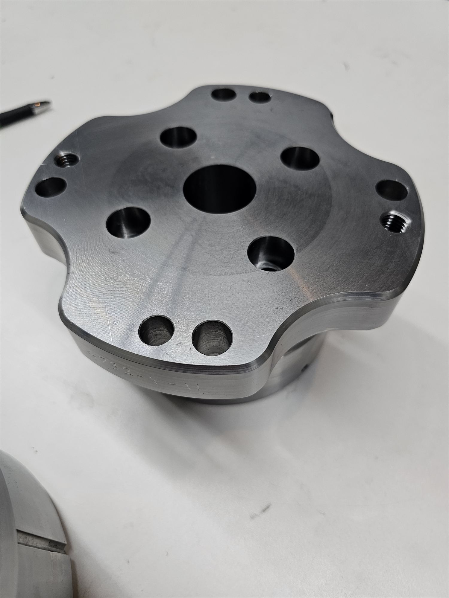 Milled features on a punch holder