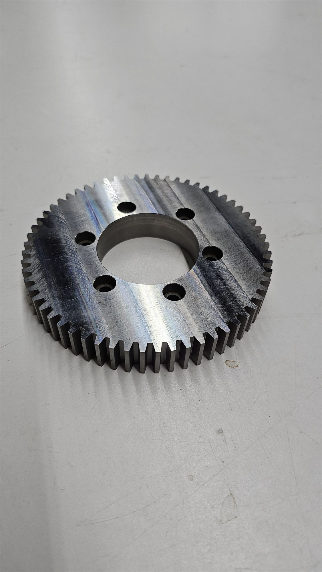 Tool-steel spur gear with a bolt circle