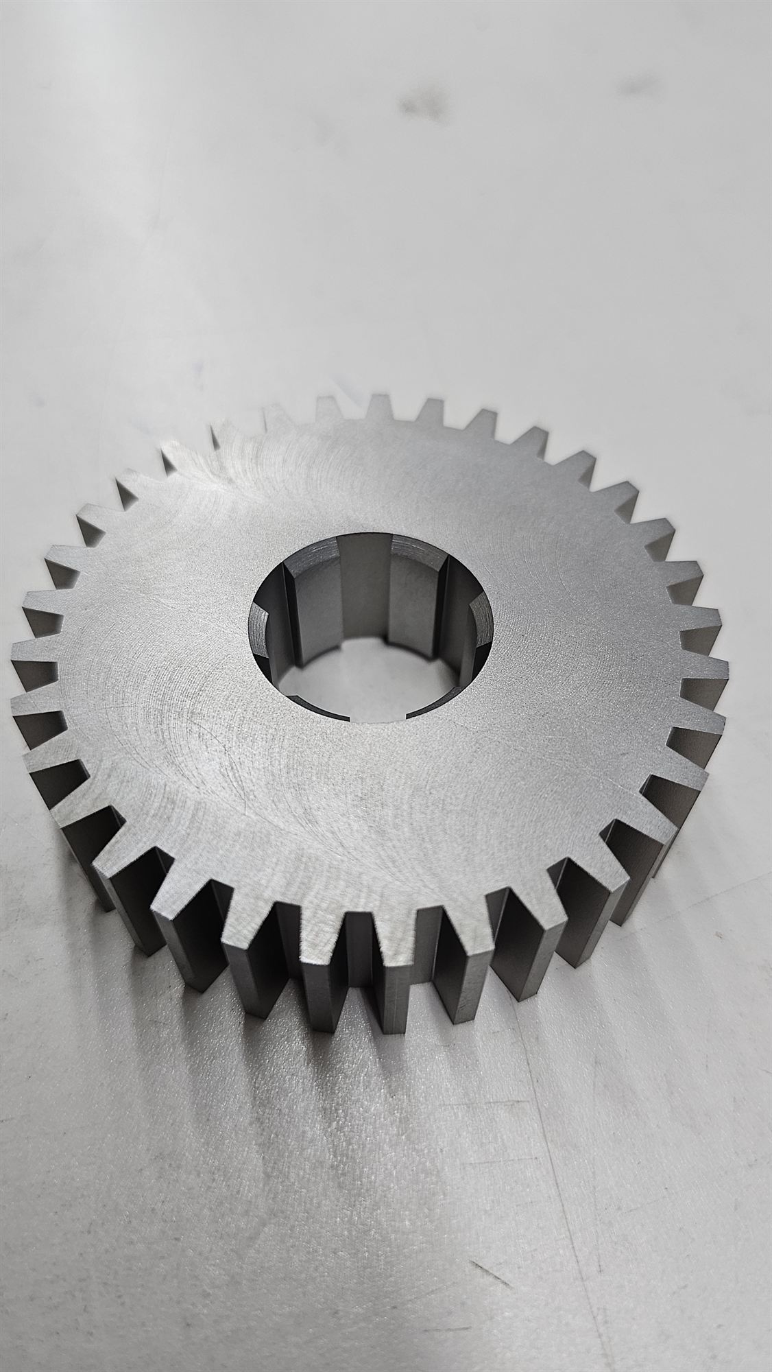 Tool-steel gear with an internal spline