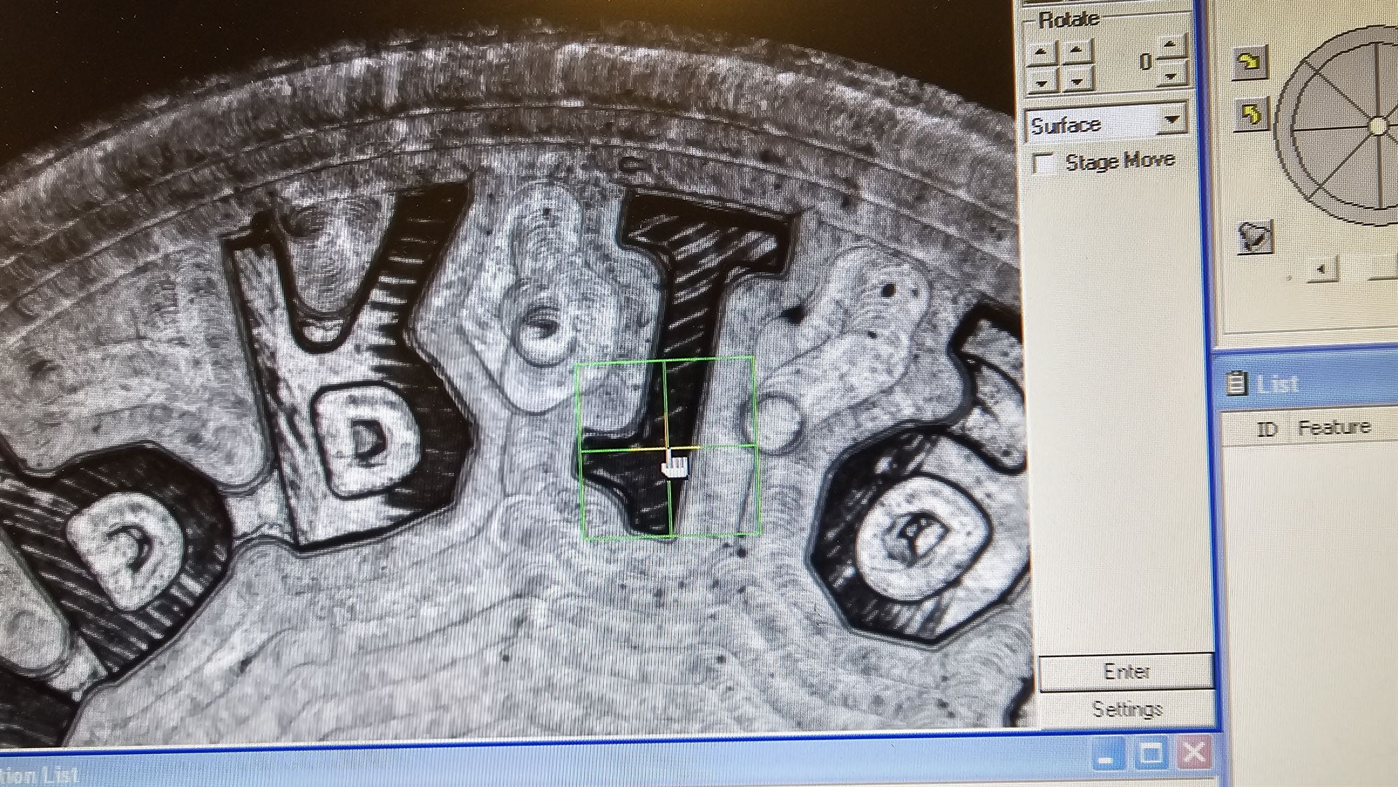 Close microscope view of sharp internal corners in the lettering